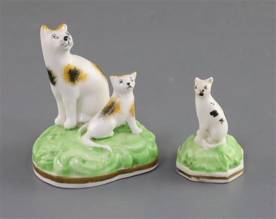 A Samuel Alcock group of a seated cat and kitten and a similar figure of a kitten, c.1840-50, H. 6.4cm and 4.3cm, slight faults